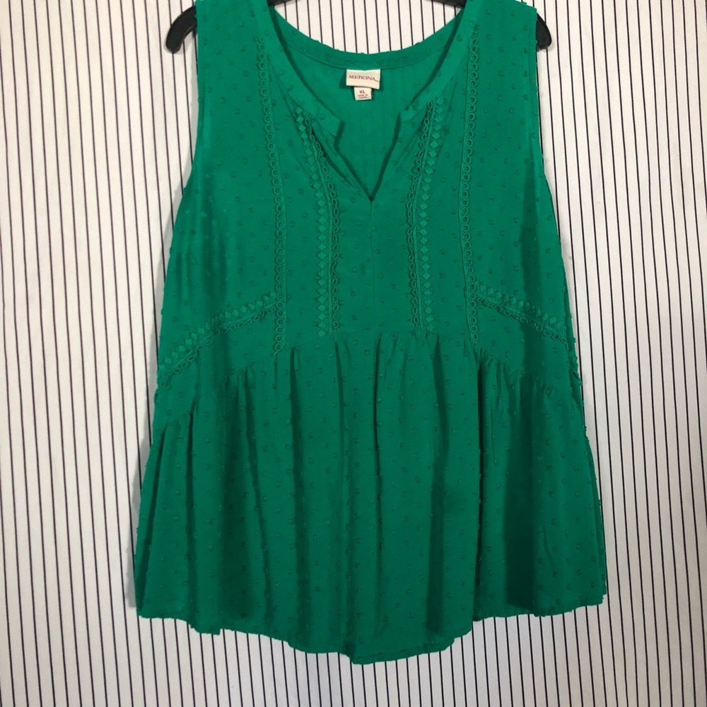 Green blouse.